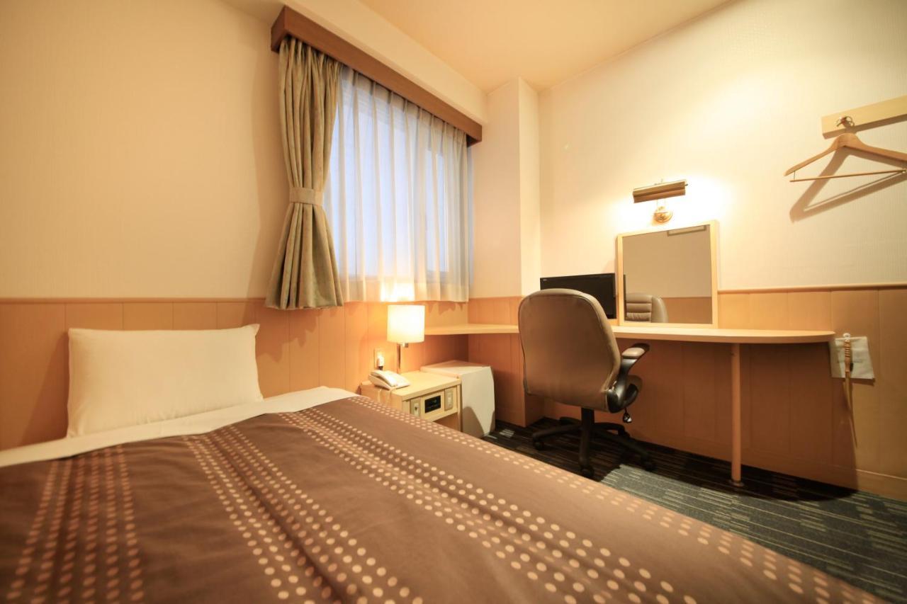 Sendai Business Hotel Bagian luar foto